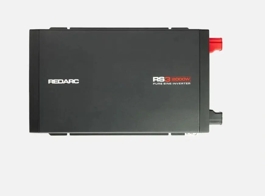 A black box with red and white lettering on it.