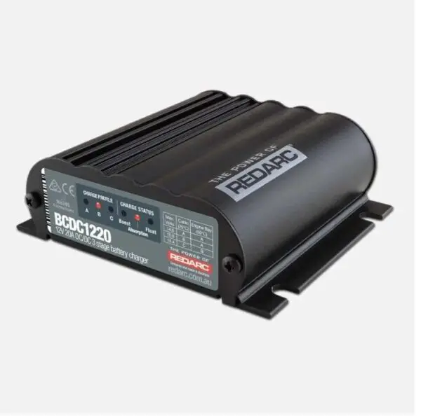 A black box with a red light on top of it.