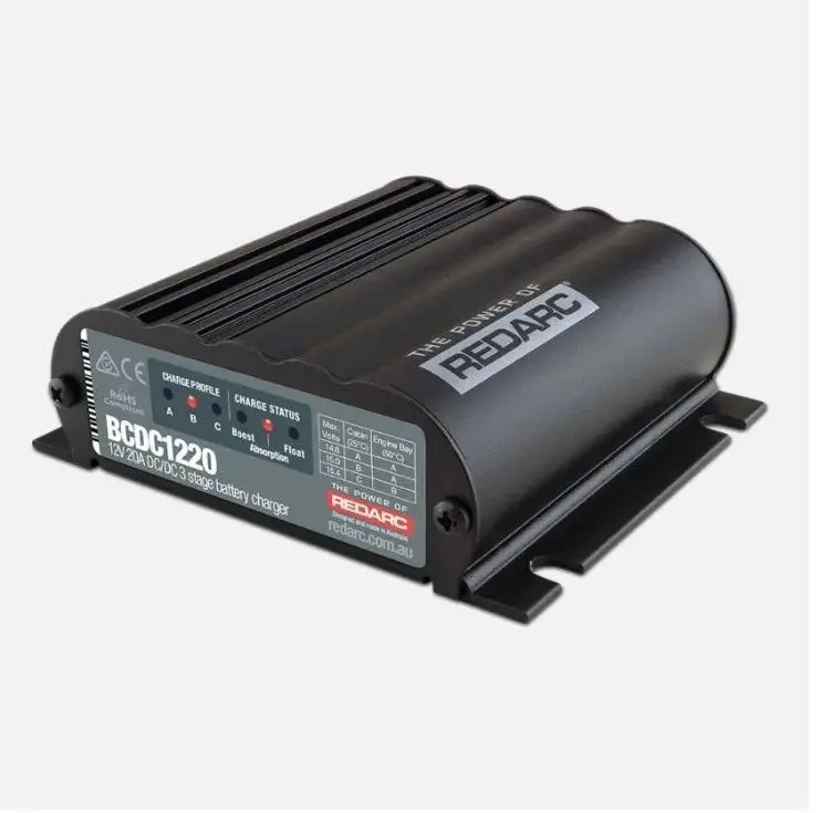 A black box with a red light on top of it.