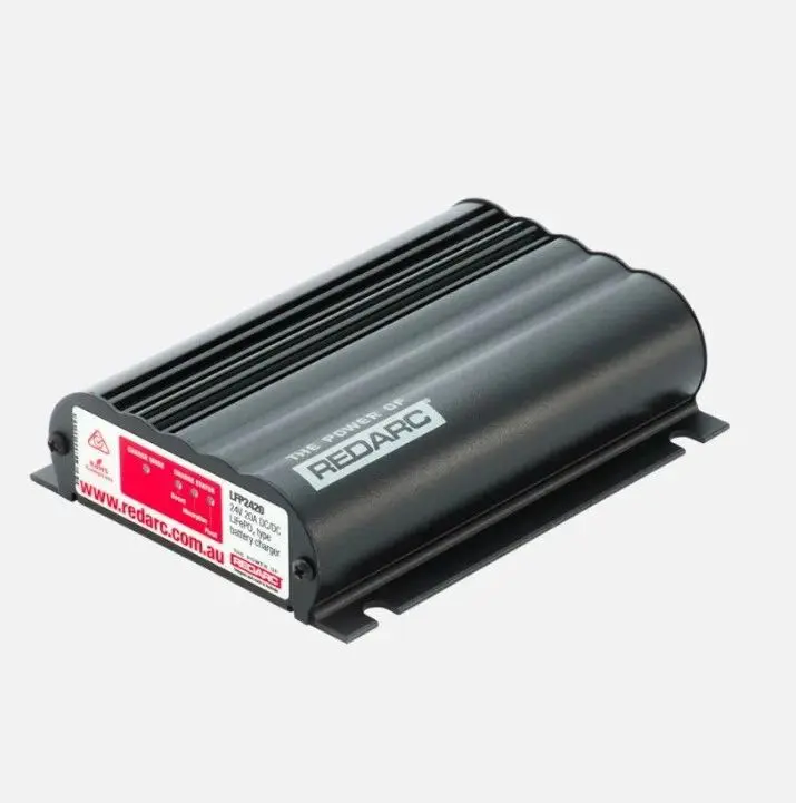 A black box with red label on top of it.