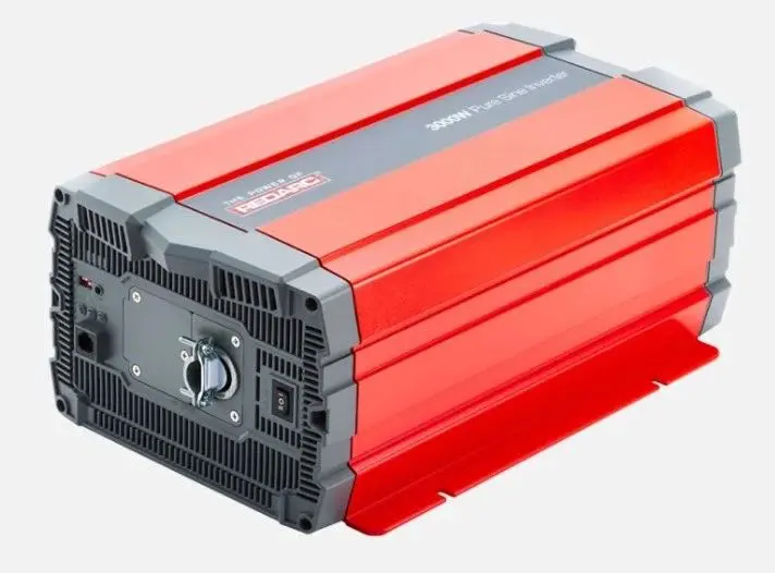 A red and black power inverter is on display.