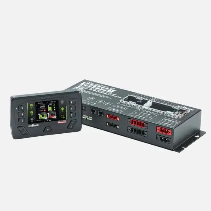 A remote control unit with two controllers and a box.